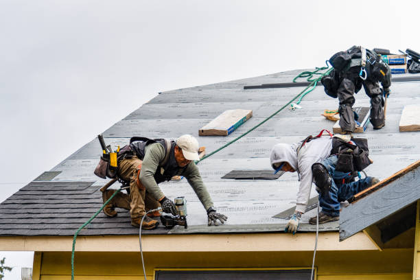 Professional Gutter Installation technician working in Everett, MA